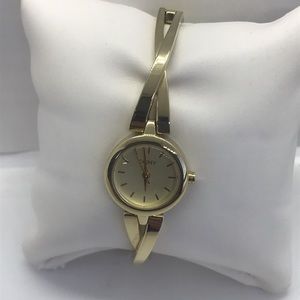 New Elegance DKNY Gold watch with gold bracelet
